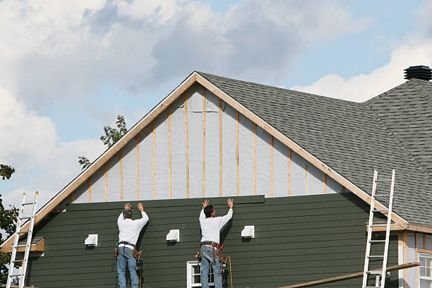 Professional Siding Replacement technician working in Pinehurst, MA